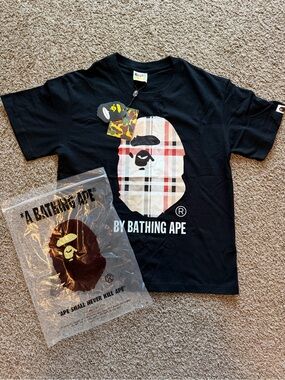 A Bathing Ape Men's Black Short-Sleeve Graphic Tee with Plaid Ape Head